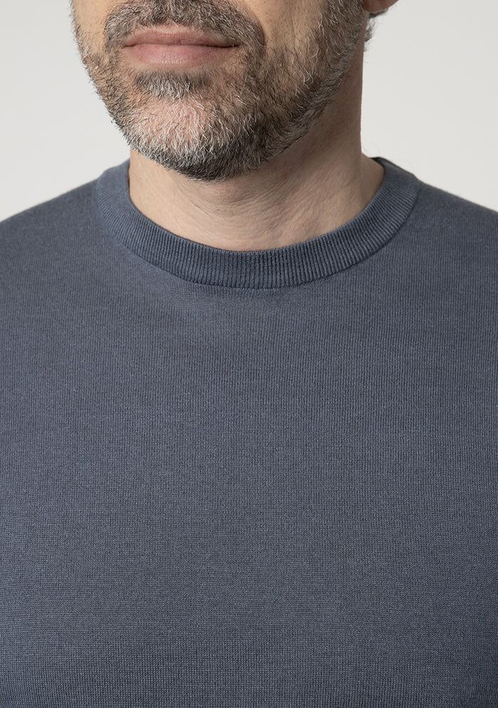 Men's Ravello silk cashmere crew neck sweater in oceano blue, worn, Addison Geneva #color_oceano